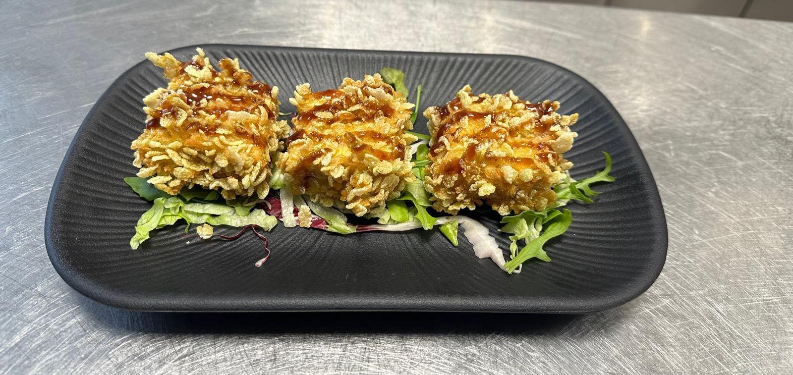 Crispy Bites — Knusprig panierte Häppchen mit süß-saurer Sauce